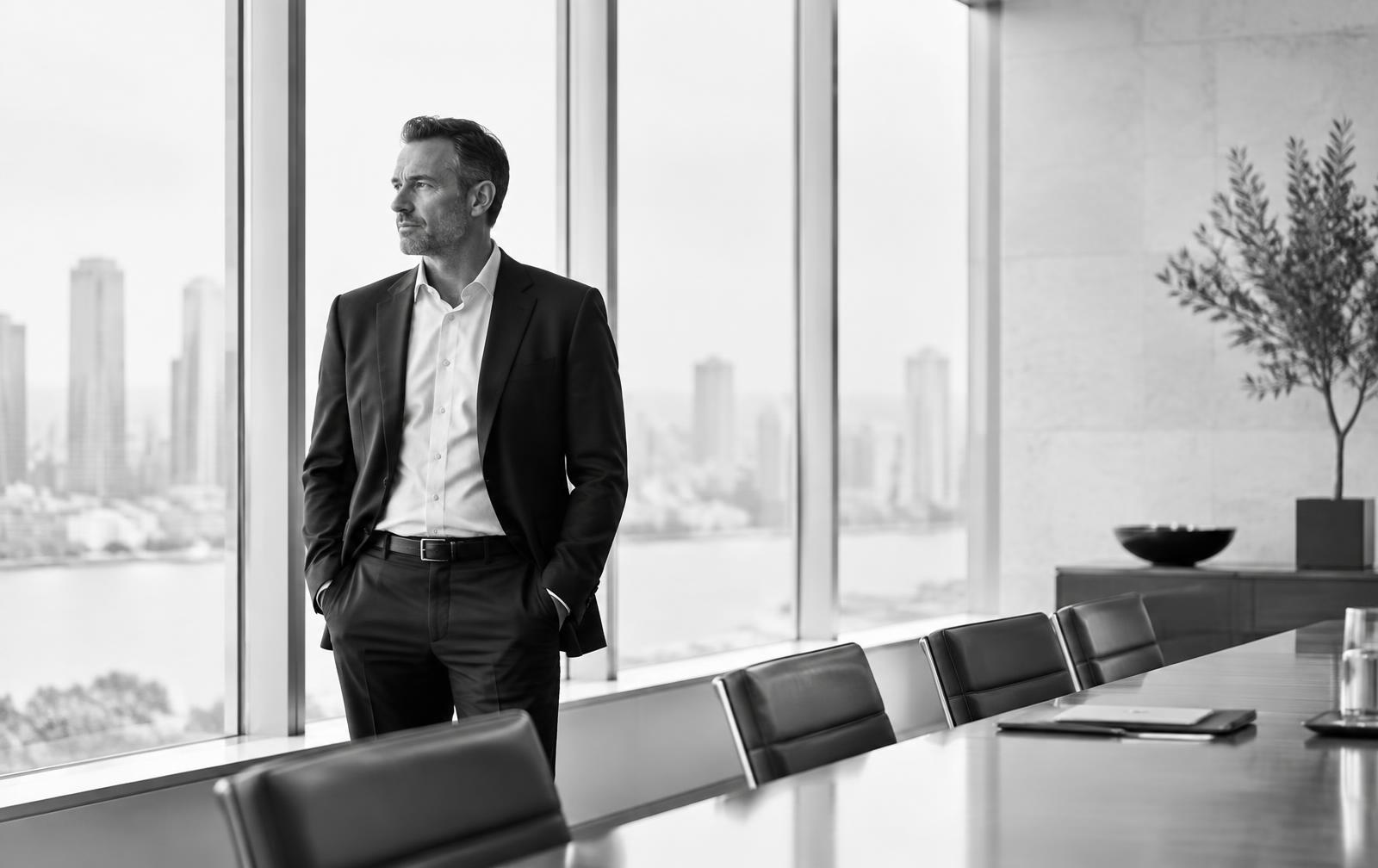 Executive leader examining how personal patterns and blind spots shape organizational culture